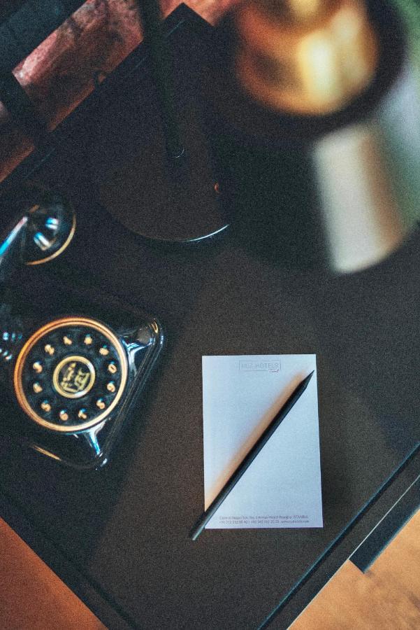 Ruz Hotels Стамбул Экстерьер фото A telephone with a built-in memo pad
